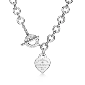 Sterling silver with a round brilliant diamond